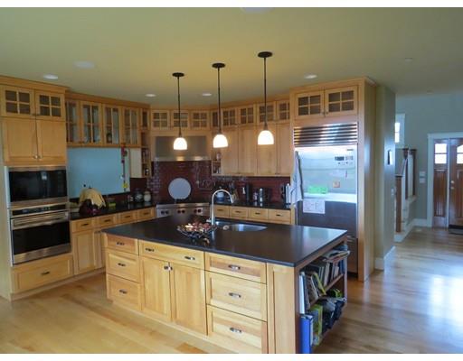 38 Ridge View Road Northampton, MA 01062 - Photo 3 of 30 a kitchen with stainless steel appliances granite countertop a sink a stove and a wooden floors