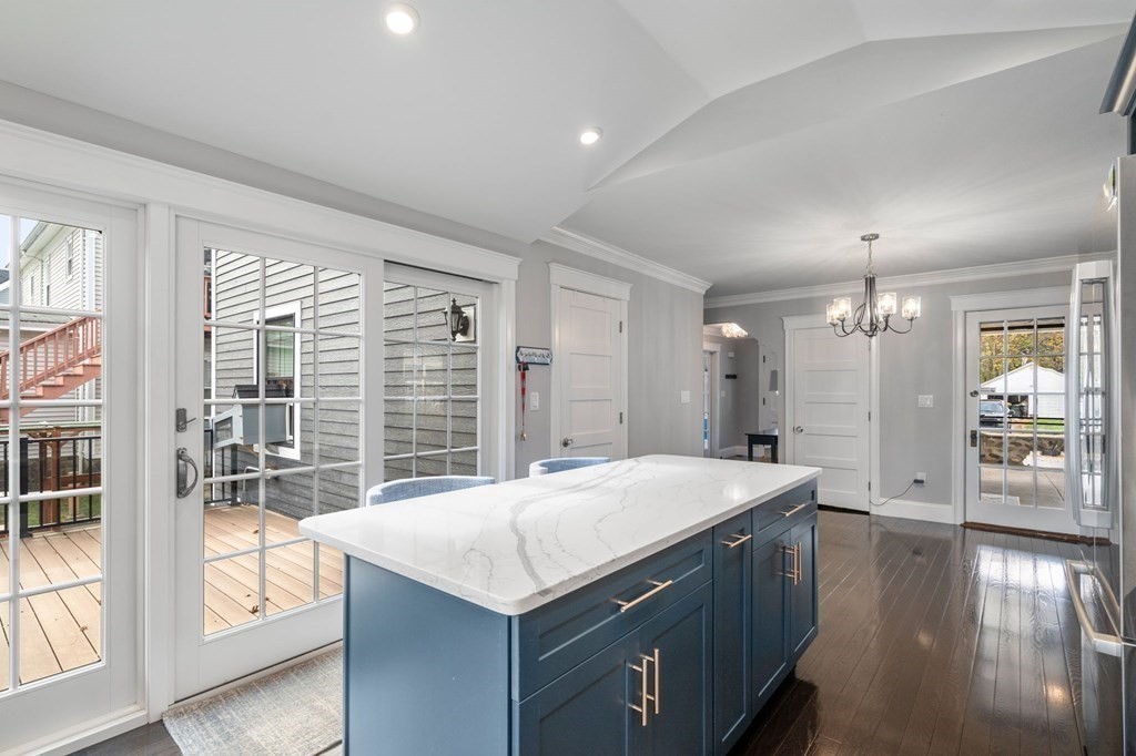 43 O'Neil Street Hudson, MA 01749 - Photo 17 of 39 a room with a large window and kitchen view