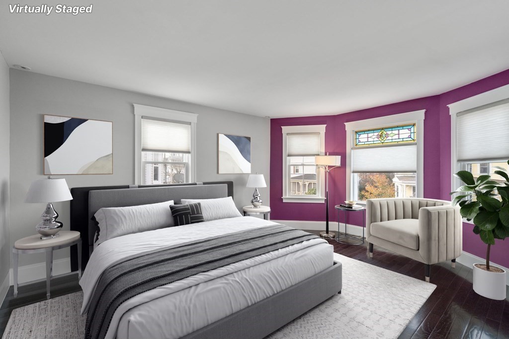 43 O'Neil Street Hudson, MA 01749 - Photo 22 of 39 a bedroom with a large bed and a couch