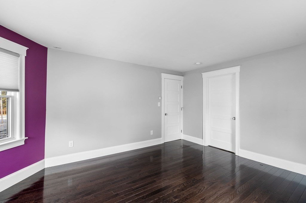 43 O'Neil Street Hudson, MA 01749 - Photo 24 of 39 a view of a room with wooden floor and windows