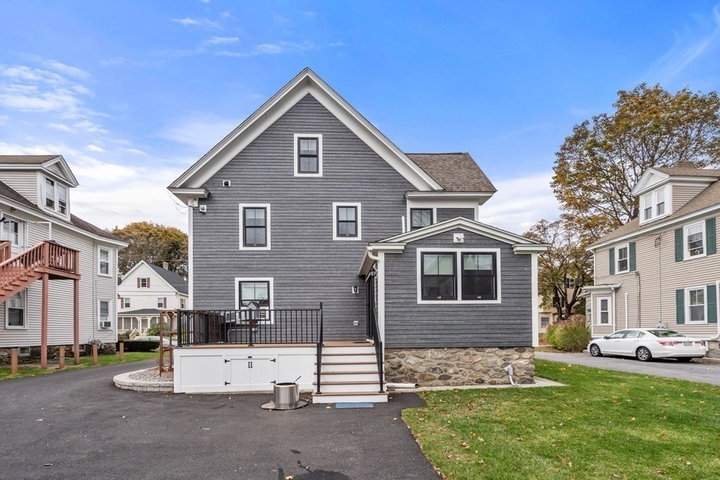 43 O'Neil Street Hudson, MA 01749 - Photo 37 of 39 a front view of a house with a yard