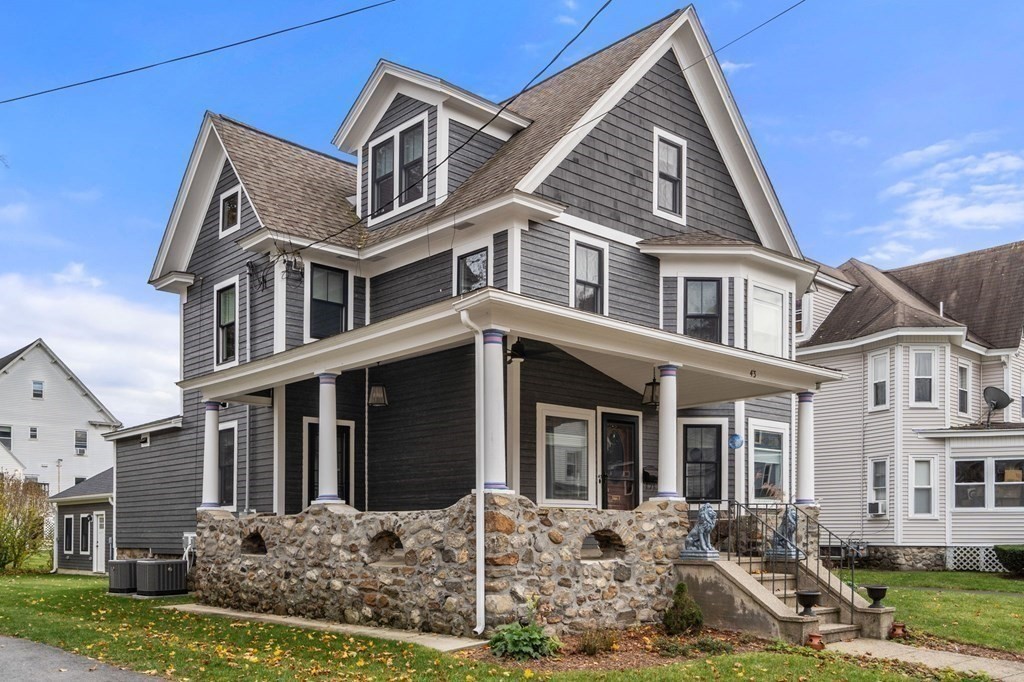 43 O'Neil Street Hudson, MA 01749 - Photo 38 of 39 a front view of a house with a yard