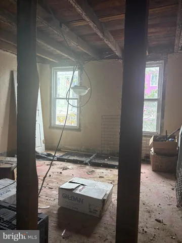 a room with furniture and a window