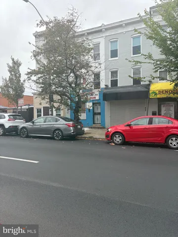 a car parked in front of a building