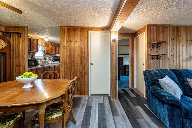 a kitchen with a stove and a refrigerator