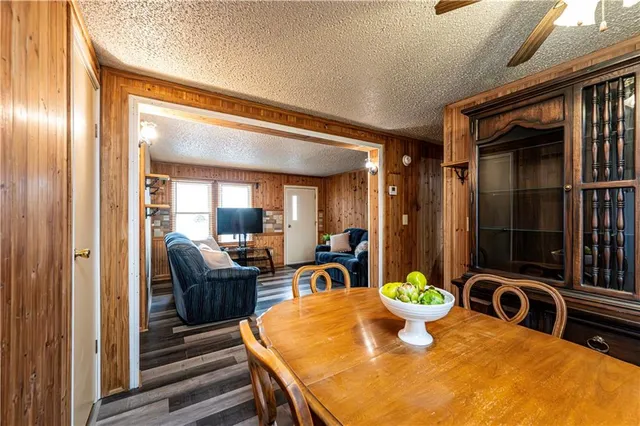 a bathroom with a sink a vanity and a shower