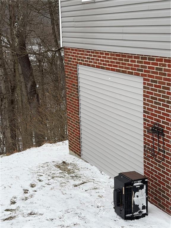 303 Mt Manor Road Manor, PA 15665 - Photo 7 of 43 The garage door is behind the siding. If you want to use the basement area as garage space you would have to add fire related walls and ceiling inside