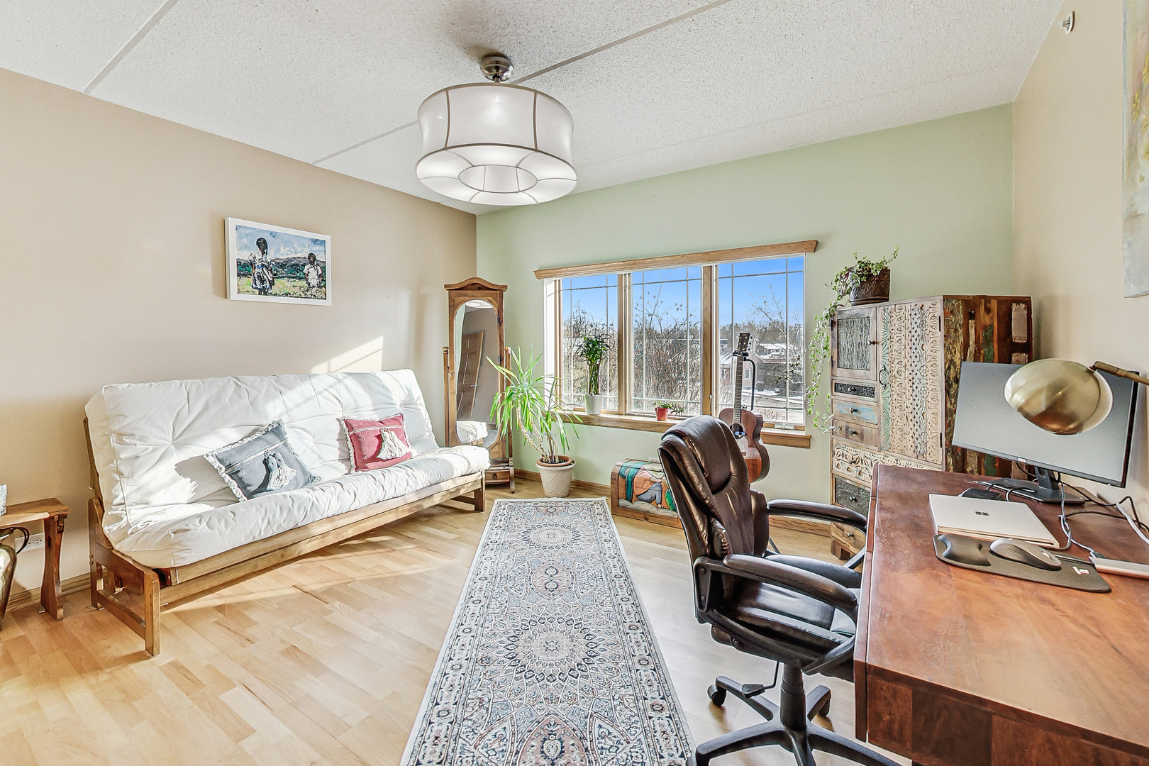 911 Busse Highway, Unit 204 Park Ridge, IL 60068 - Photo 20 of 31 a living room with furniture chess table and a large window