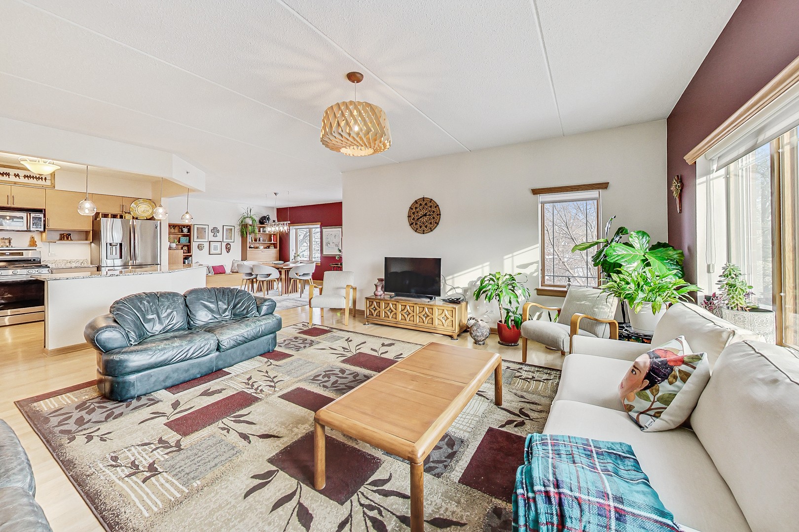 911 Busse Highway, Unit 204 Park Ridge, IL 60068 - Photo 7 of 31 a living room with furniture and a large window