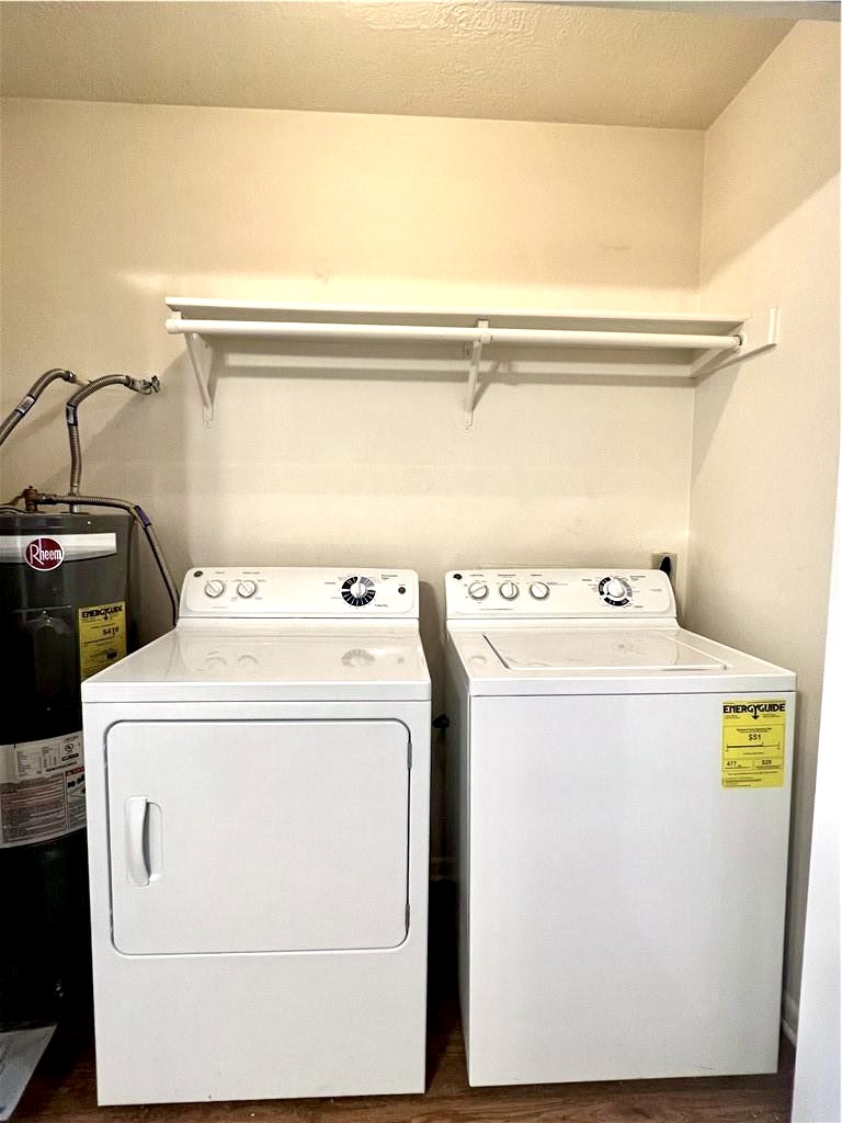 918 Spring Loop, Unit A College Station, TX 77840 - Photo 9 of 12 a utility room with dryer and washer