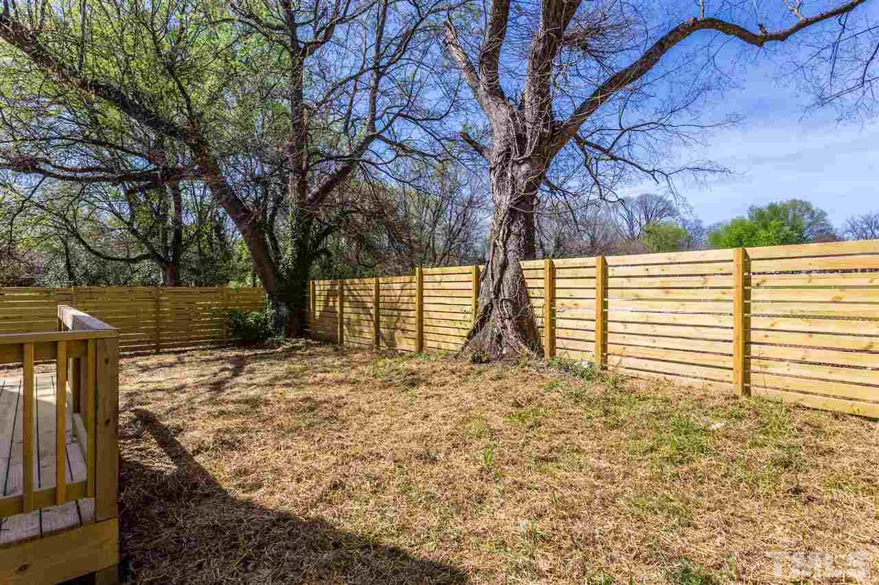 811 Postell Street Raleigh, NC 27601 - Photo 19 of 20 a view of a yard with plants and trees