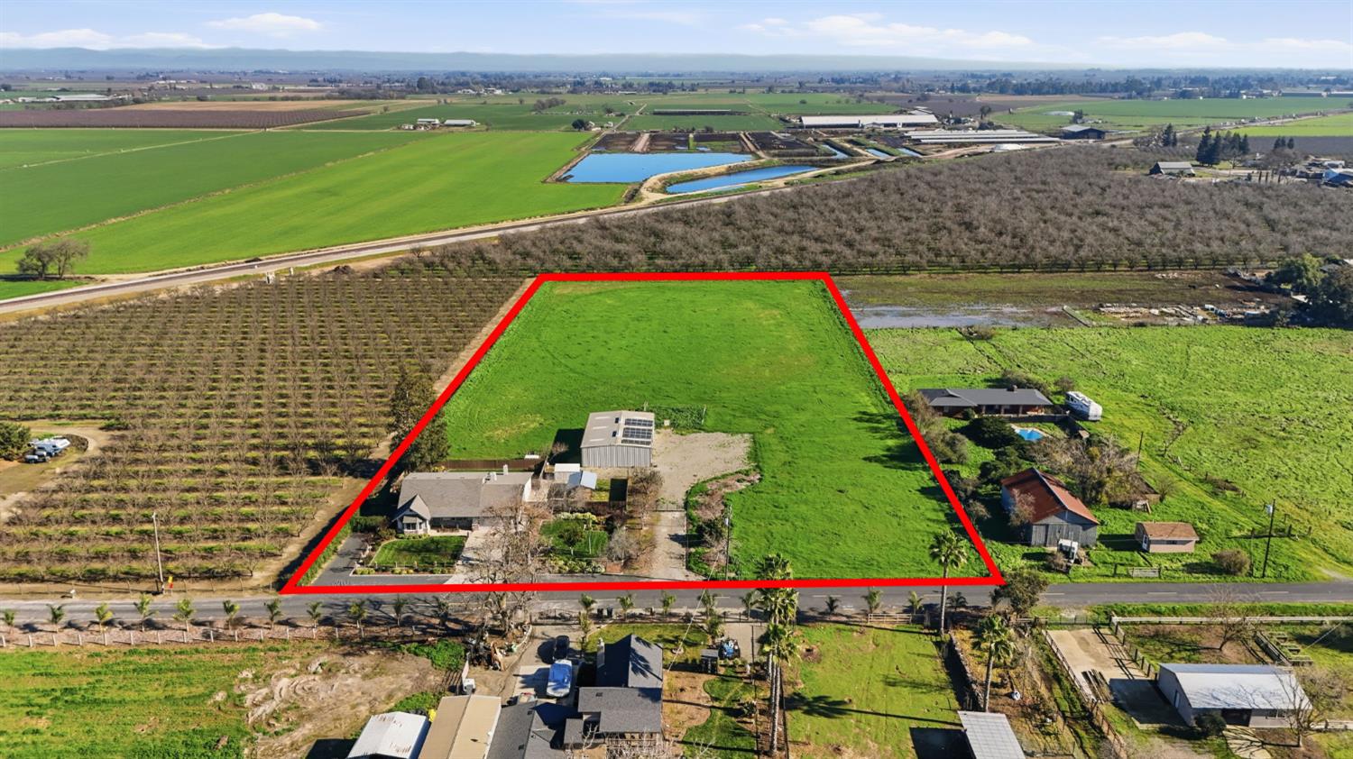 16166 Lawrence Road Escalon, CA 95320 - Photo 38 of 56 an aerial view of tennis court