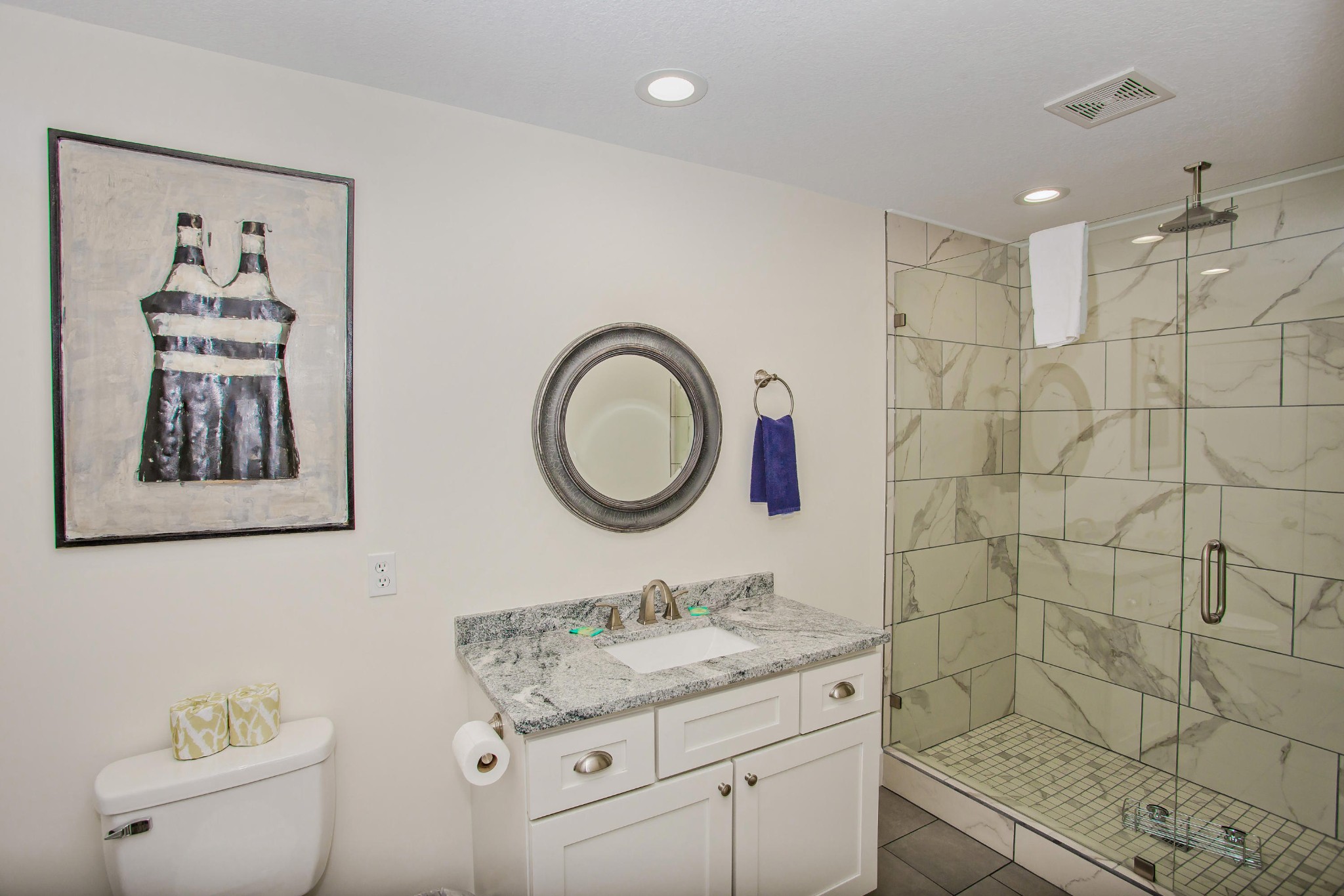 3202 Hickey Road Sevierville, TN 37876 - Photo 16 of 28 a bathroom with a granite countertop sink a mirror and a shower