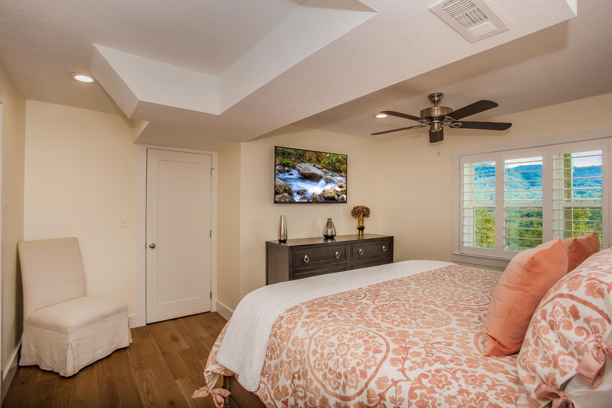 3202 Hickey Road Sevierville, TN 37876 - Photo 18 of 28 a bedroom with a bed a couch and a large window