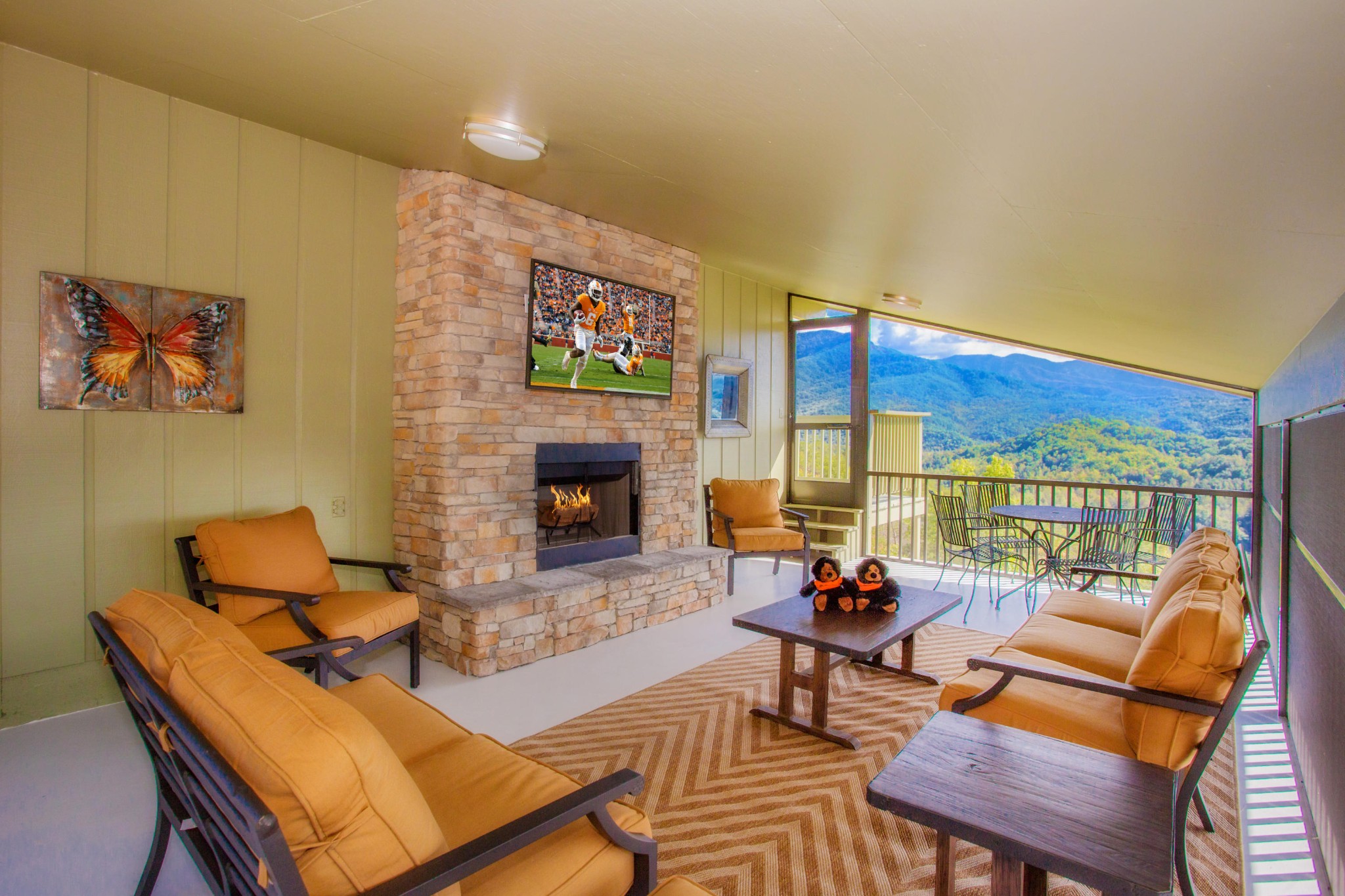3202 Hickey Road Sevierville, TN 37876 - Photo 21 of 28 a living room with furniture a fireplace and a flat screen tv