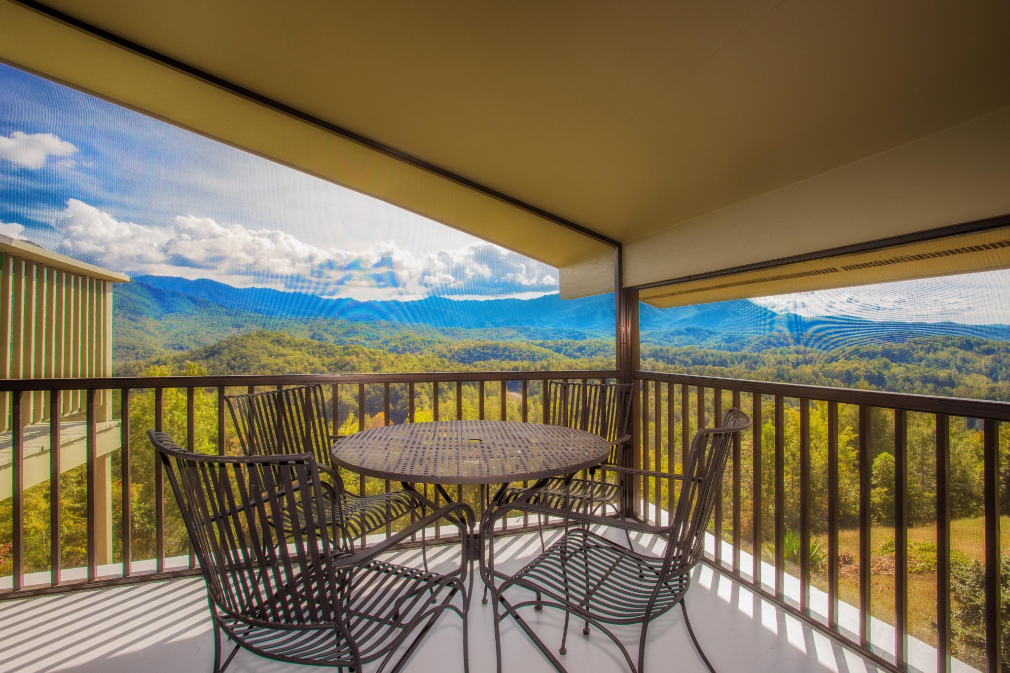 3202 Hickey Road Sevierville, TN 37876 - Photo 22 of 28 a view of a balcony with table and chairs