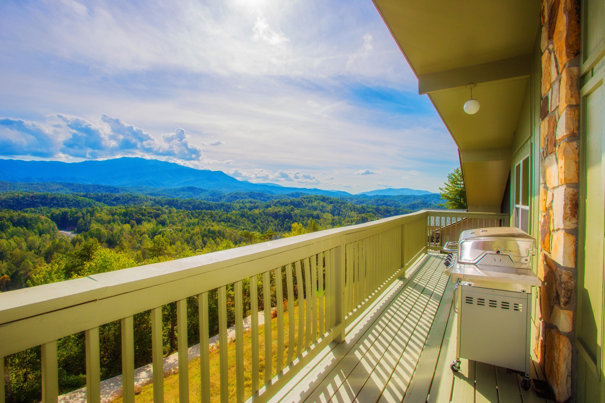 3202 Hickey Road Sevierville, TN 37876 - Photo 25 of 28 a view of a balcony with wooden floor and fence