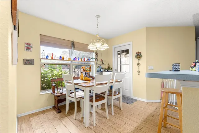 a view of a dining room kitchen and a window