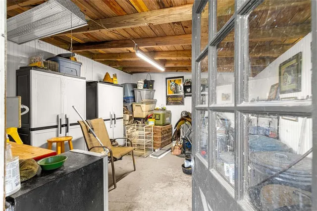 a view of a patio with table and chairs