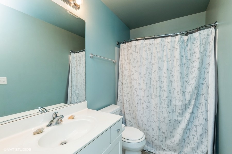 9675 Newton Road Huntley, IL 60142 - Photo 11 of 18 a bathroom with a sink and toilet
