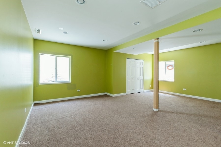 9675 Newton Road Huntley, IL 60142 - Photo 15 of 18 a view of an empty room with a window