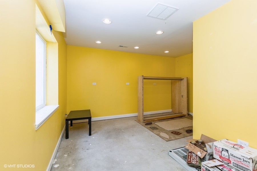9675 Newton Road Huntley, IL 60142 - Photo 17 of 18 a view of a room with furniture and a window