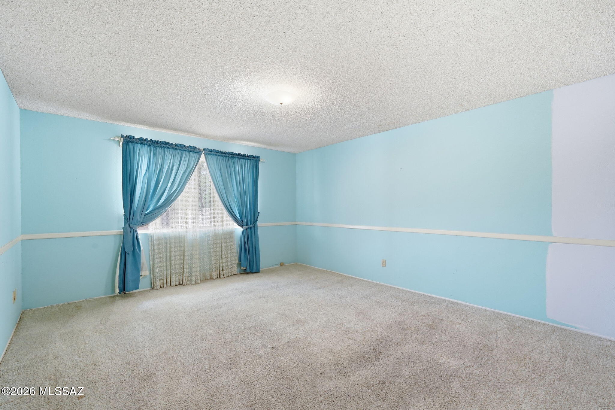 6741 North Pomona Road Tucson, AZ 85704 - Photo 18 of 38 Large primary room
