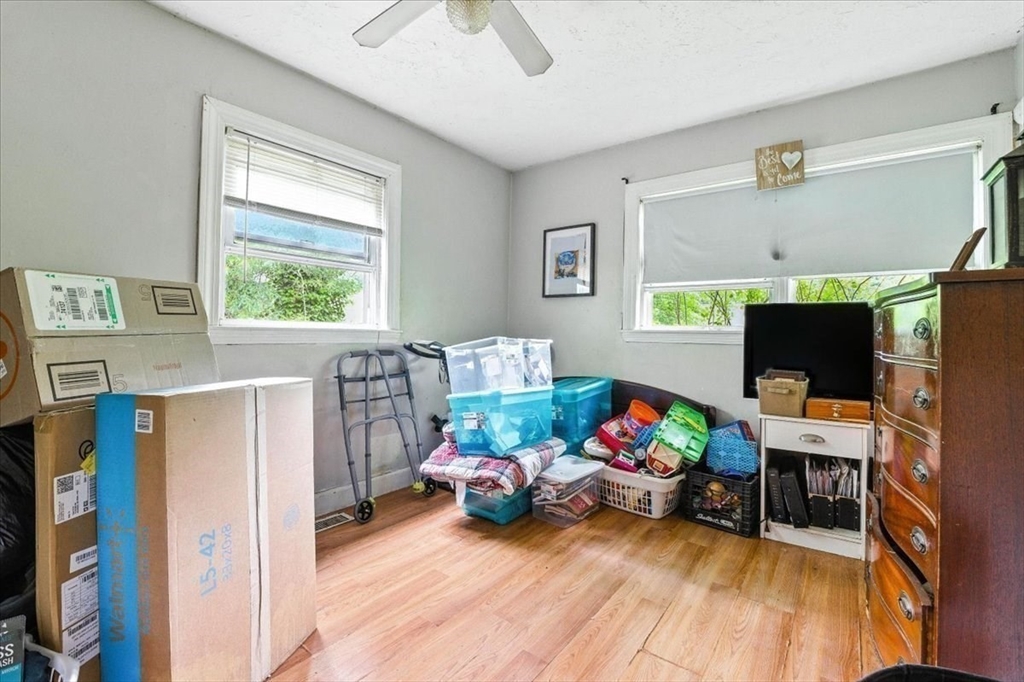 15 Kalmia Road Holbrook, MA 02343 - Photo 18 of 21 a living room with furniture and a flat screen tv