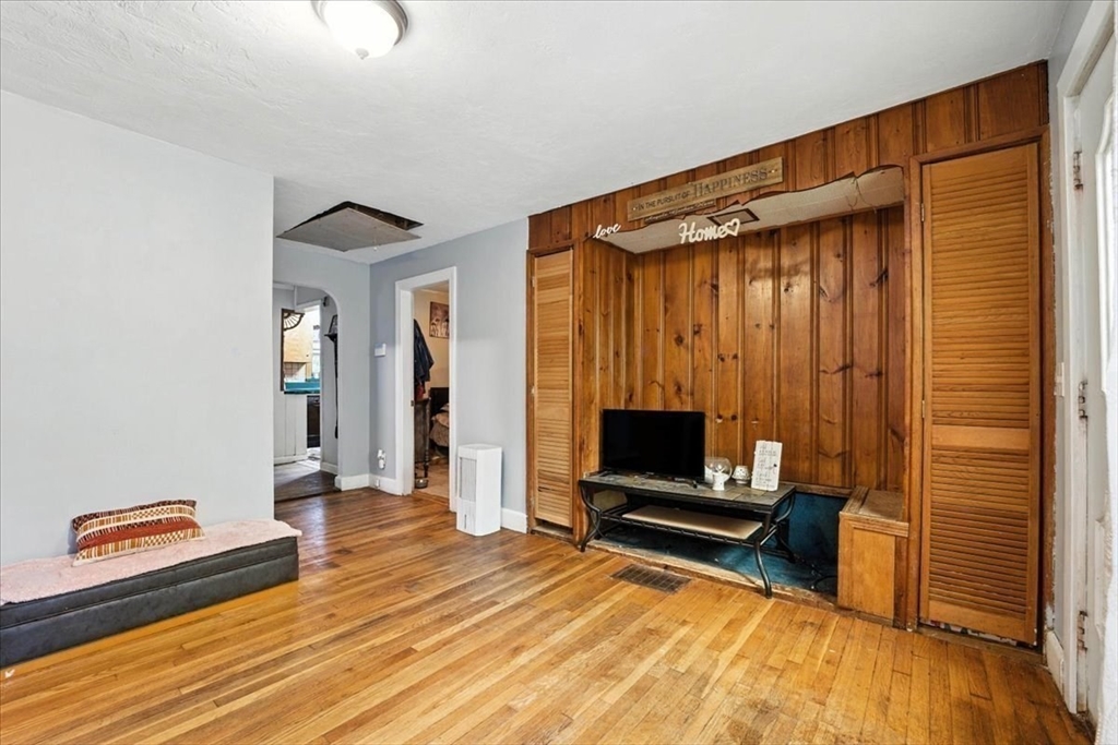 15 Kalmia Road Holbrook, MA 02343 - Photo 9 of 21 a view of room with wooden floor