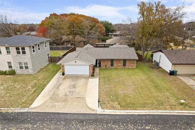 front view of house with a yard