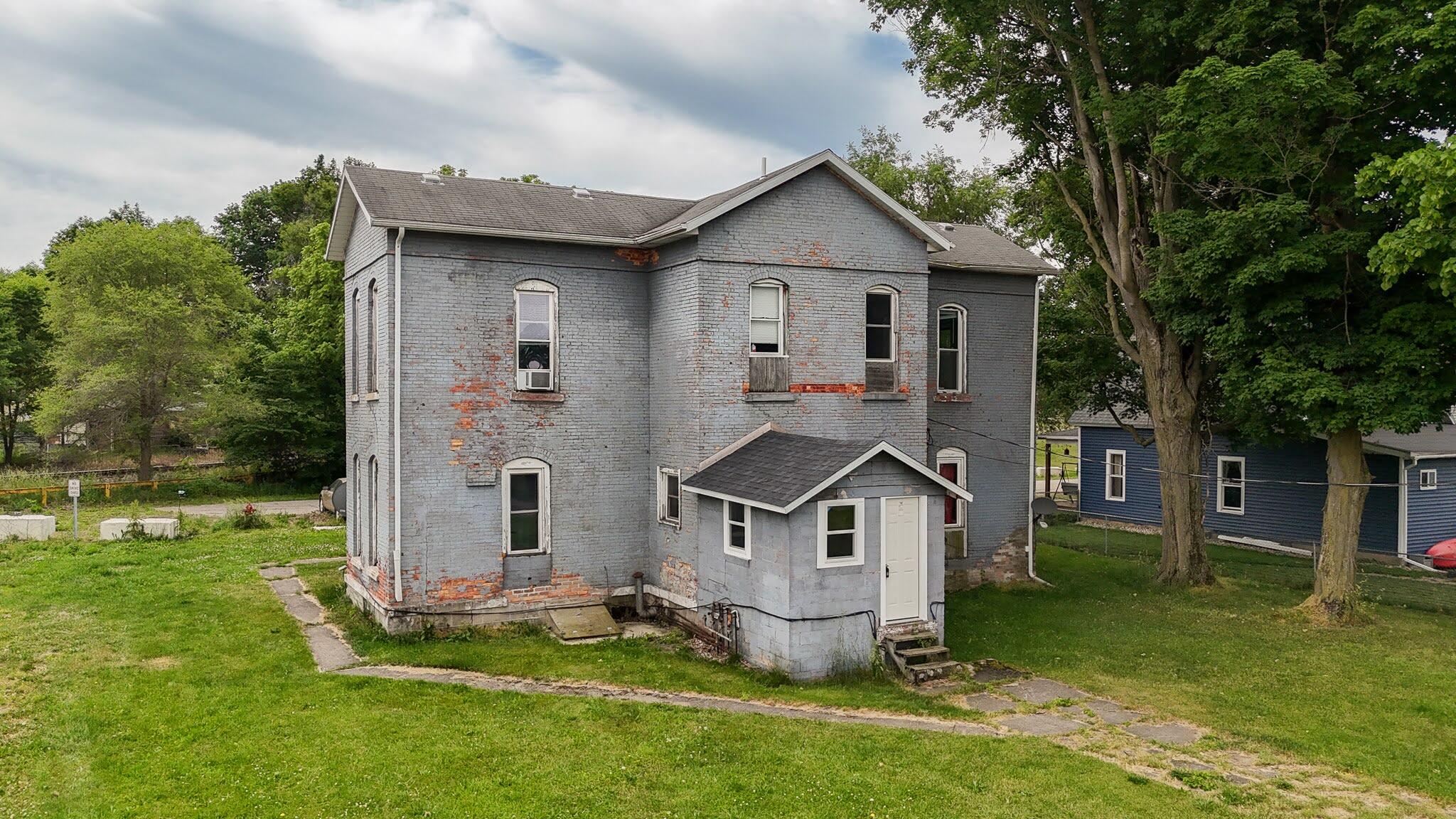 173 East Dibble Street Marcellus, MI 49067 - Photo 2 of 19 dji_fly_20260601_113326_0494_17803285501