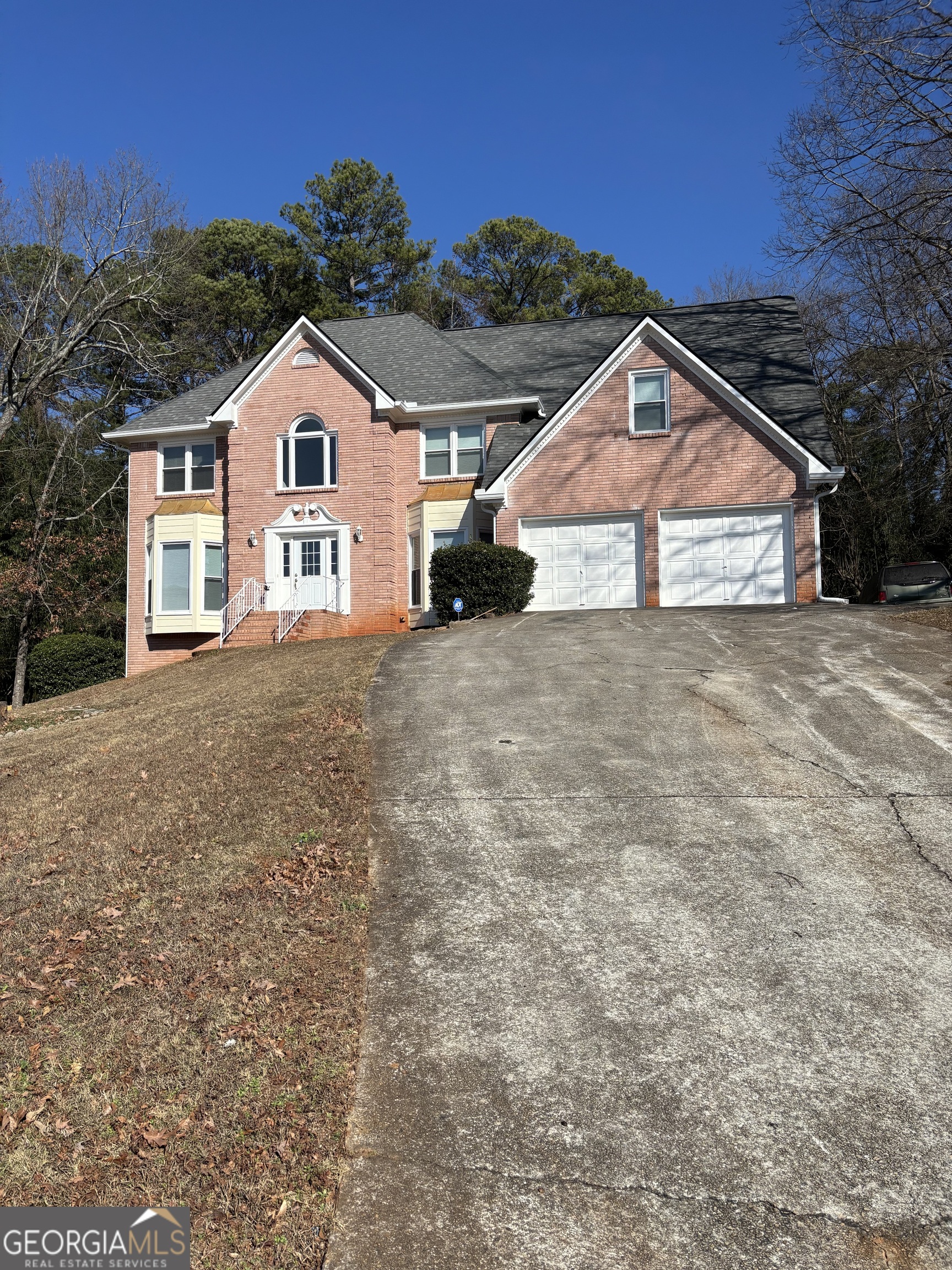 2972 Hampton Place Decatur, GA 30034 - Photo 1 of 19 a view of house with yard and garage