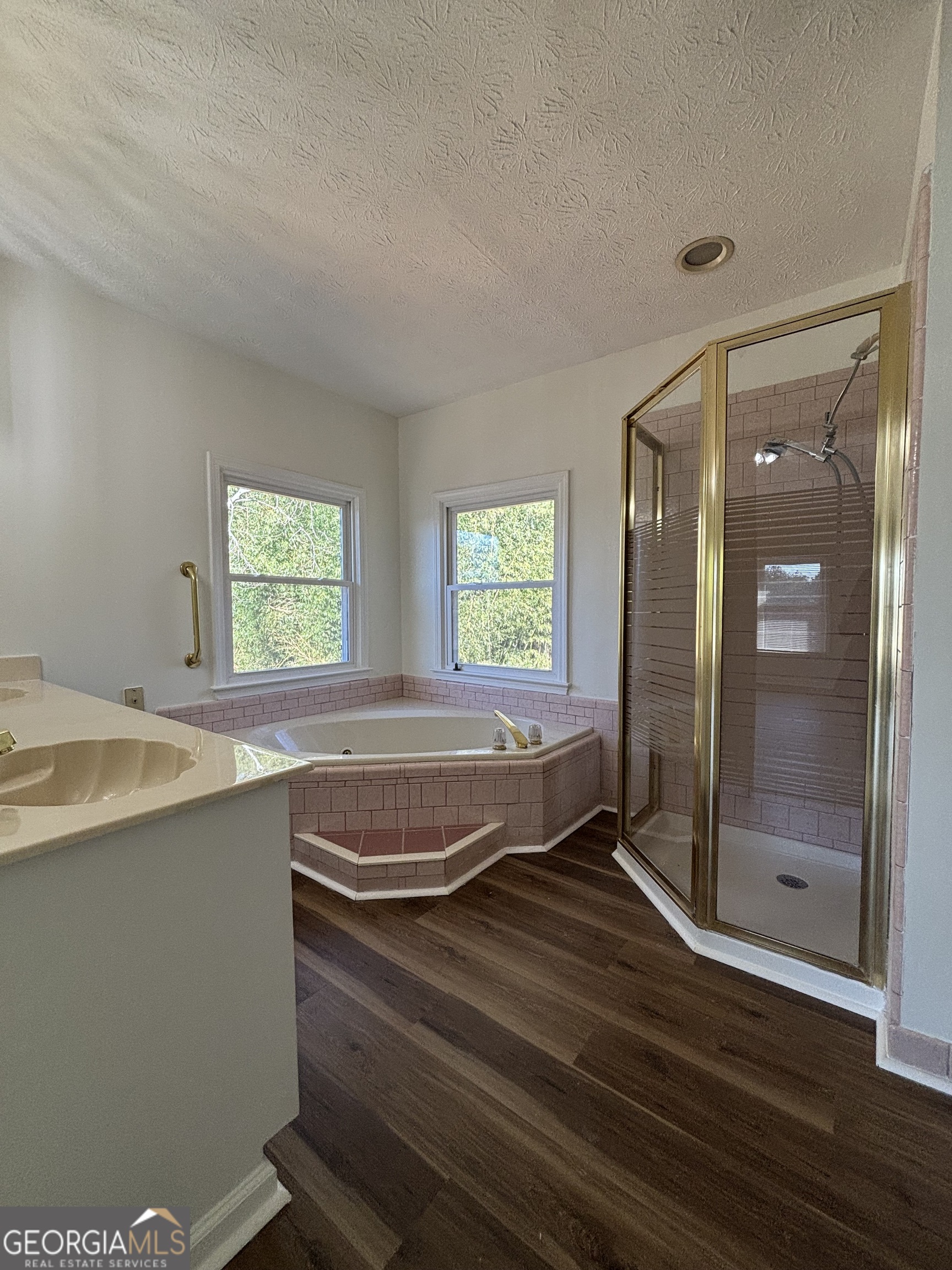 2972 Hampton Place Decatur, GA 30034 - Photo 13 of 19 a bathroom with a sink a mirror and a bathtub