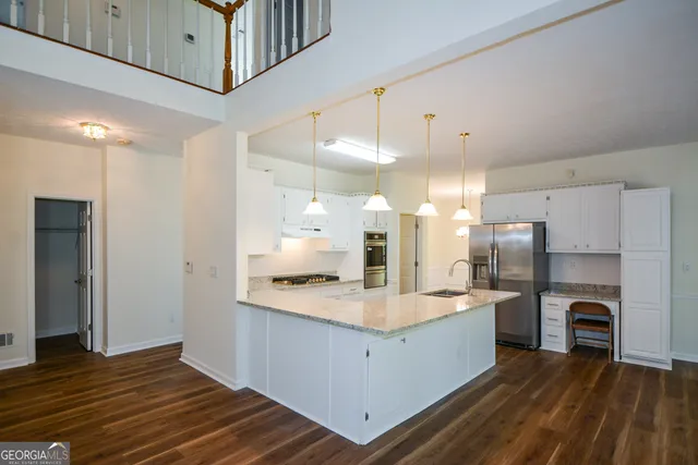 a bath tub sitting in a bathroom next to a window
