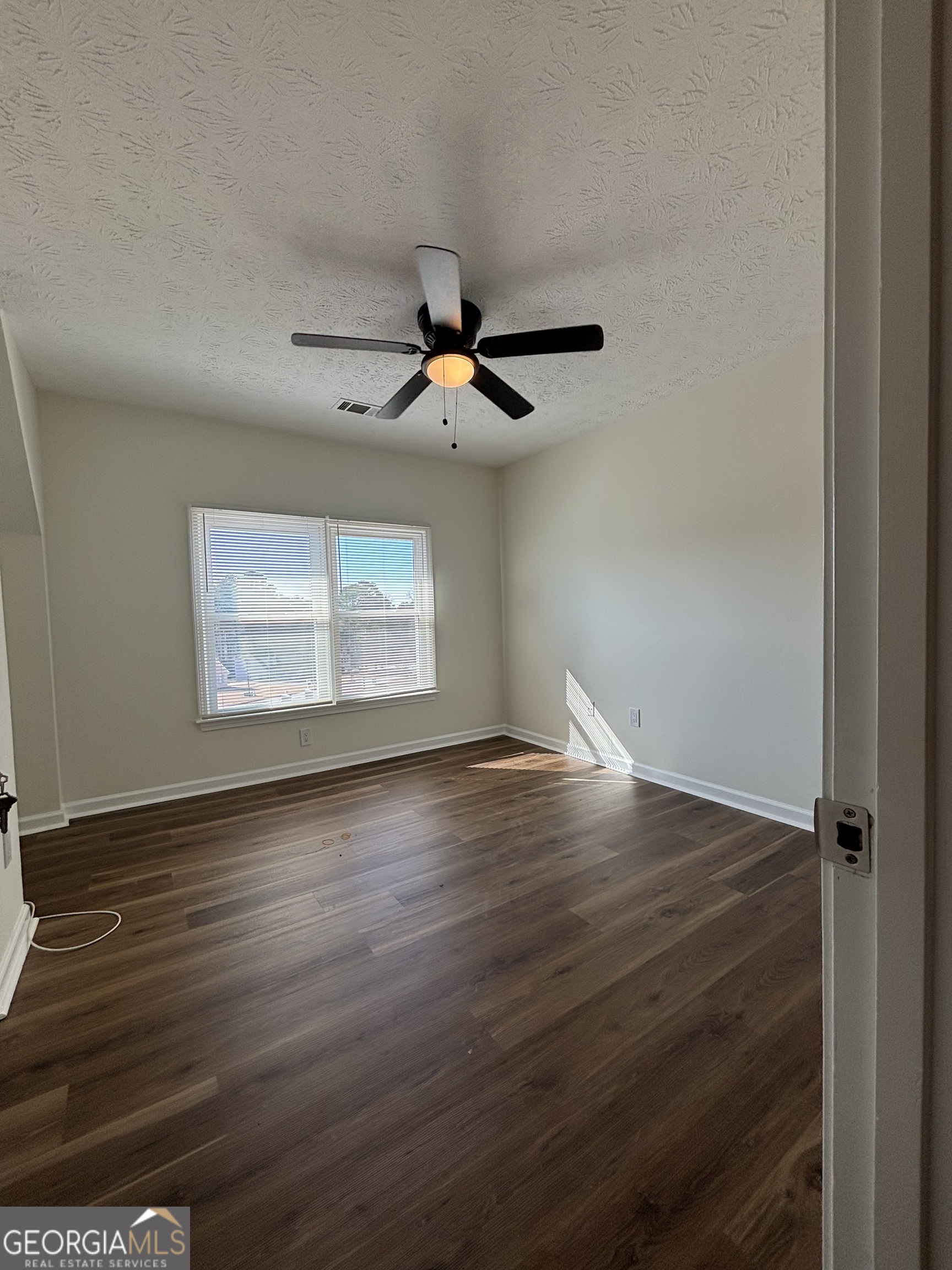 2972 Hampton Place Decatur, GA 30034 - Photo 17 of 19 an empty room with wooden floor and windows