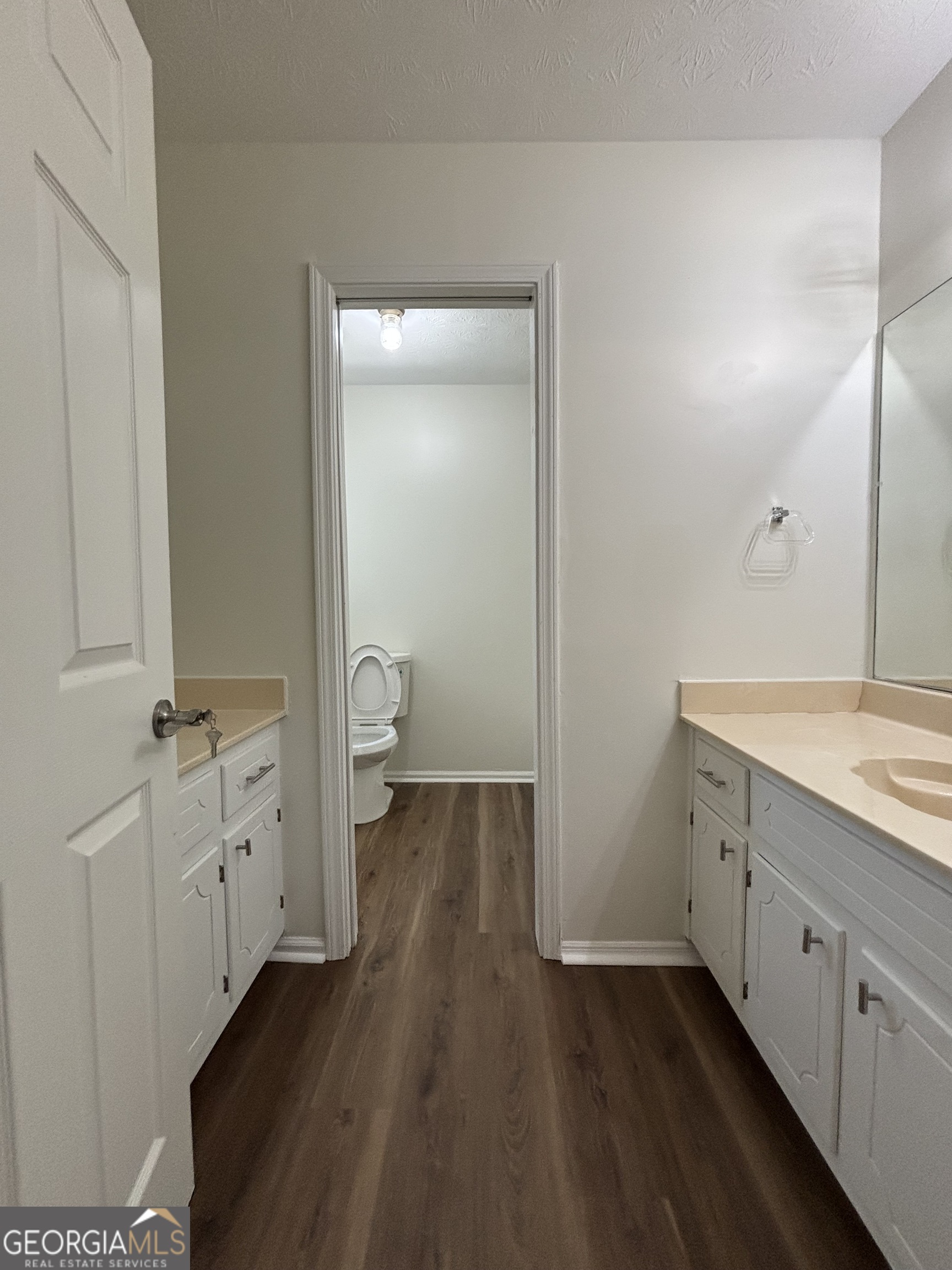 2972 Hampton Place Decatur, GA 30034 - Photo 18 of 19 a spacious bathroom with a double vanity sink and a mirror