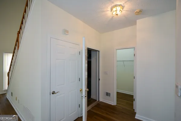 a view of a dining room with furniture and window