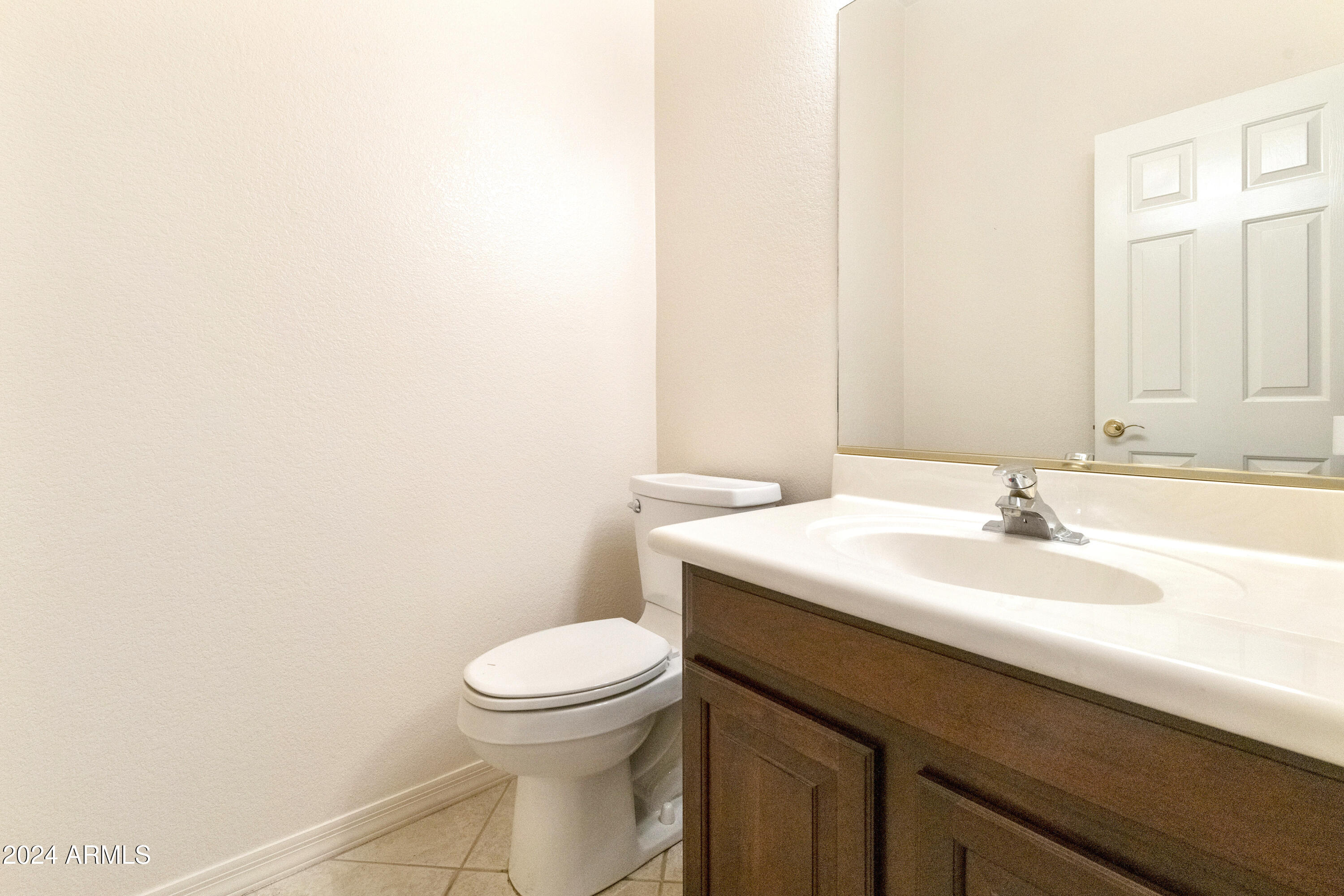 4168 East Walnut Road Gilbert, AZ 85298 - Photo 18 of 54 Half Bath between kitchen and Utility ro