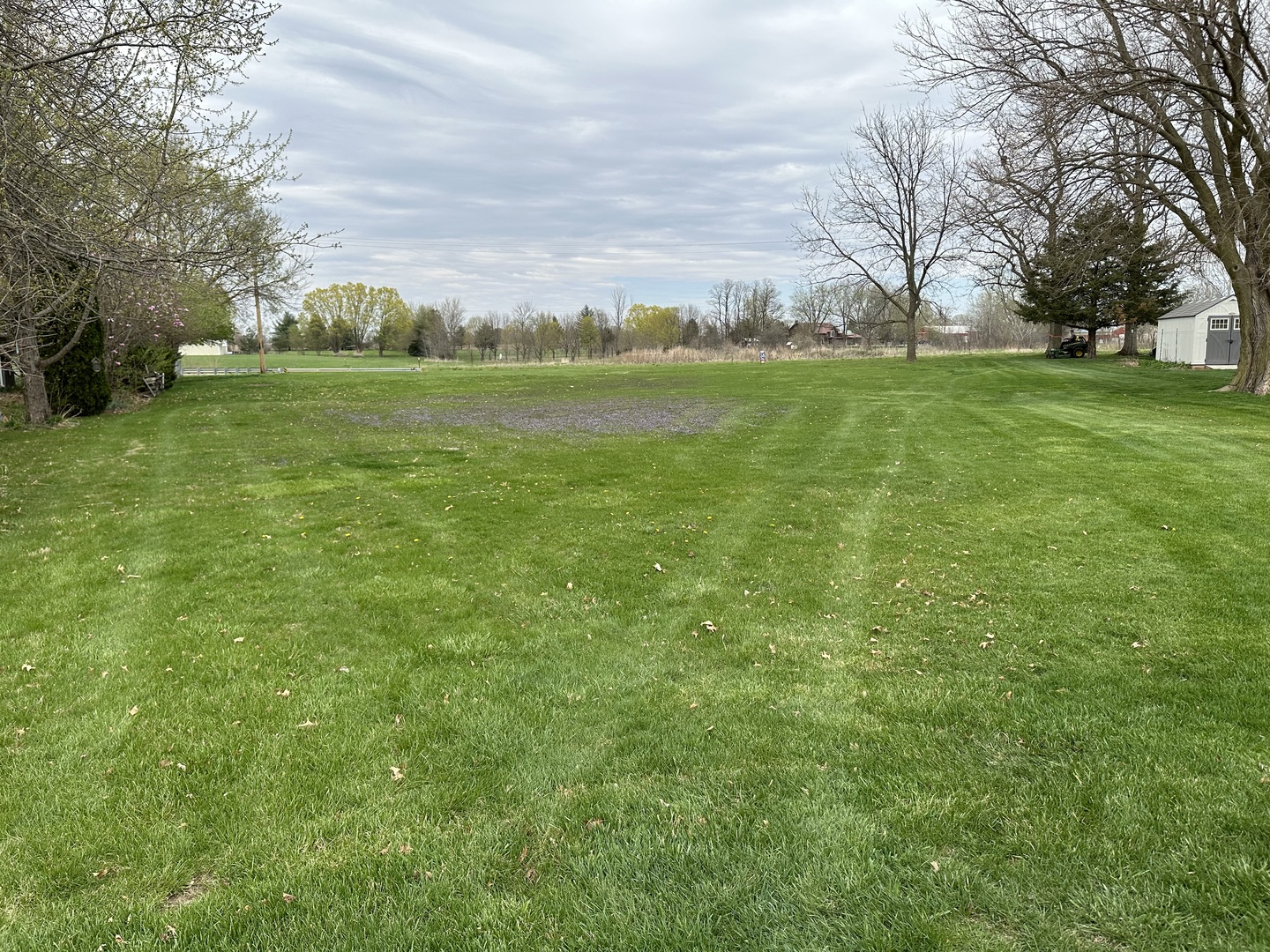 3916 East 2589th Road Sheridan, IL 60551 - Photo 3 of 3 a view of a field with grass and trees