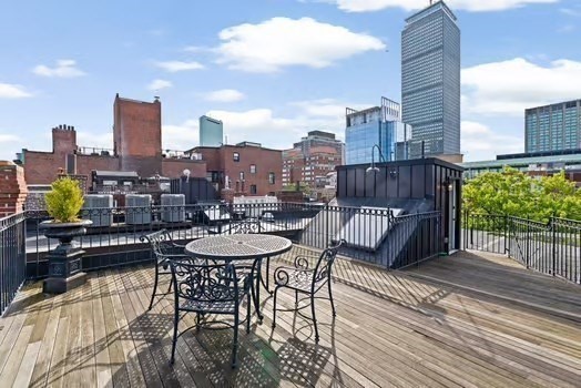 a view of a terrace with sitting area