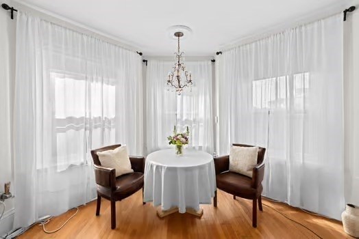 302 Commonwealth Avenue, Unit E Boston, MA 02115 - Photo 3 of 13 a dining room with furniture and window