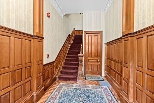 302 Commonwealth Avenue, Unit E Boston, MA 02115 - Photo 9 of 13 a view of an entryway with wooden floor