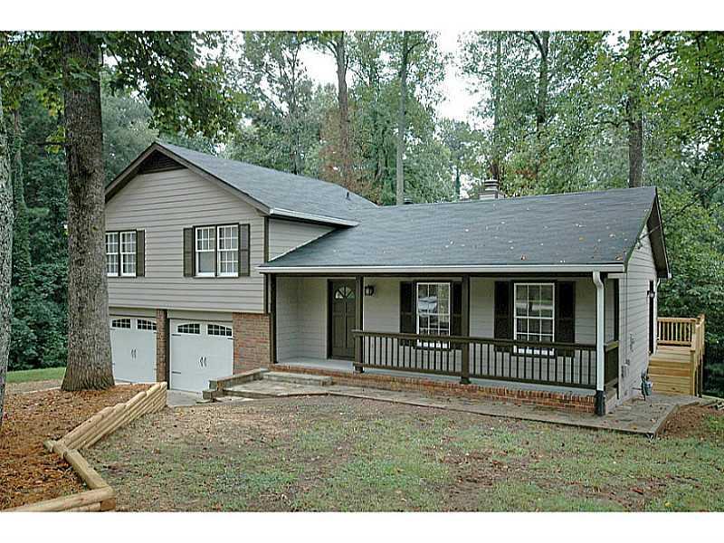 5106 Suwanee Dam Road Suwanee, GA 30024 - Photo 1 of 1 Exterior Front. LUXURIOUS RENOVATION ON 1.1 ACRE PRIVATE LOT IN SUWANEE