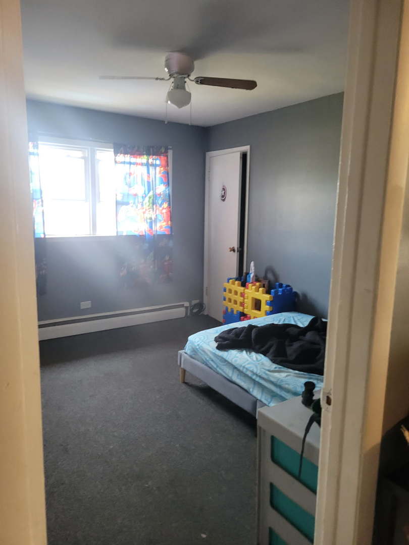14652 Spaulding Avenue Harvey, IL 60426 - Photo 11 of 18 a room with a window