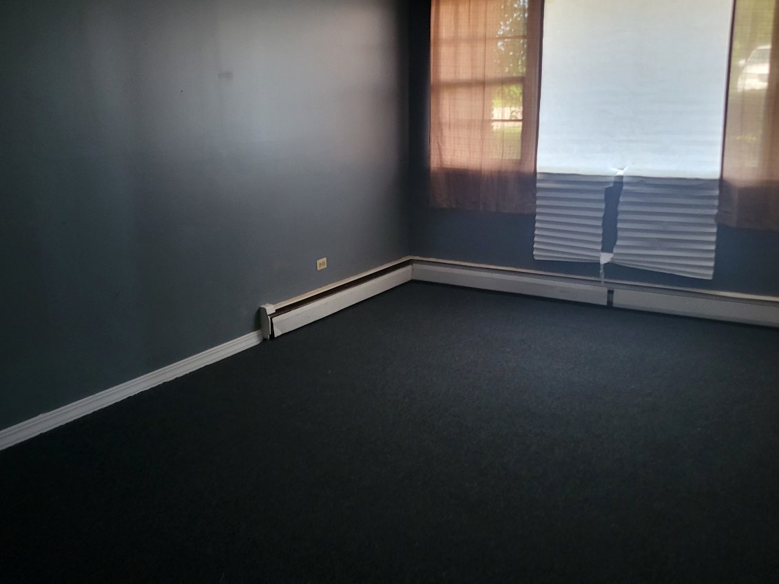 14652 Spaulding Avenue Harvey, IL 60426 - Photo 3 of 18 a view of a room with window