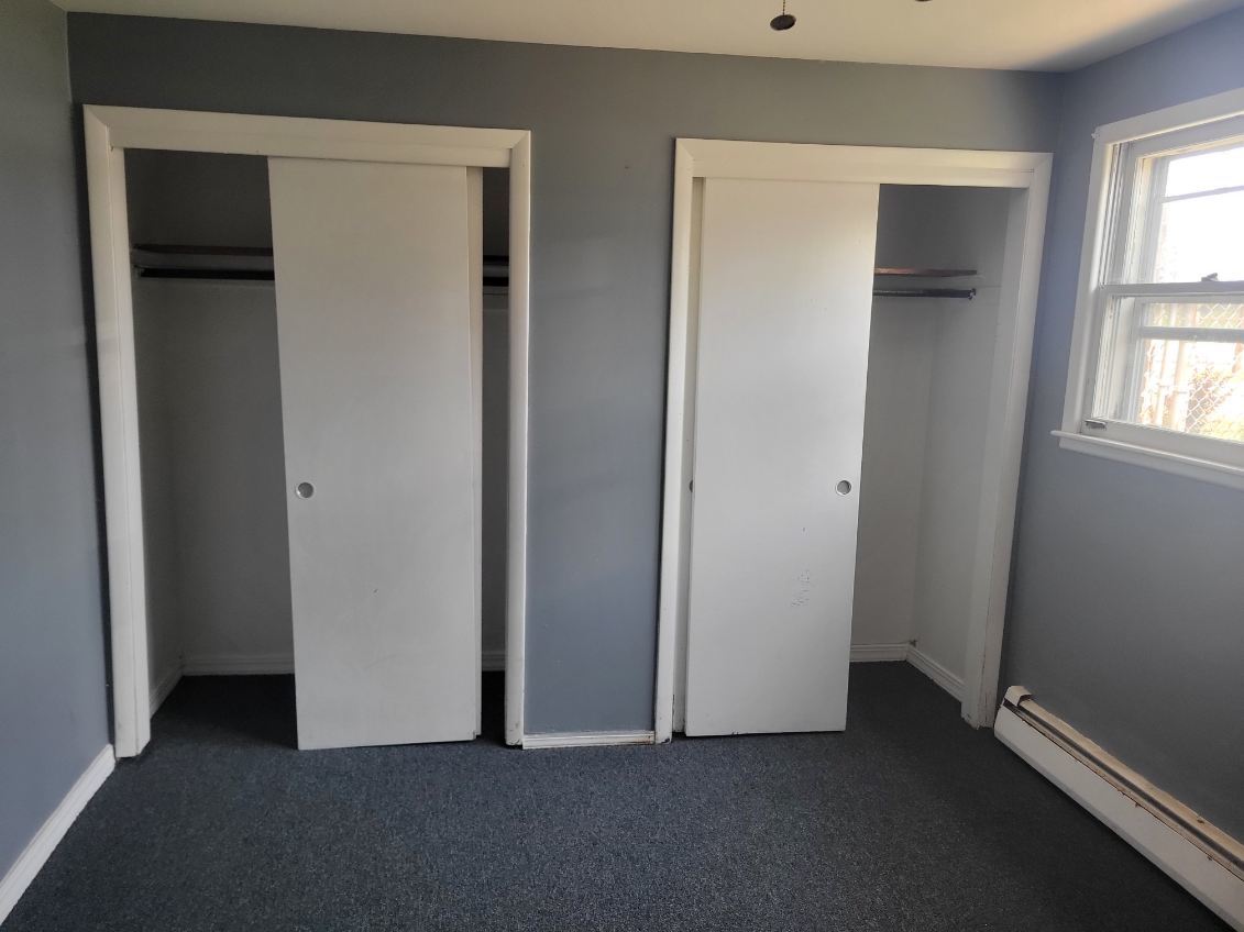 14652 Spaulding Avenue Harvey, IL 60426 - Photo 5 of 18 a view of an empty room with windows and closet