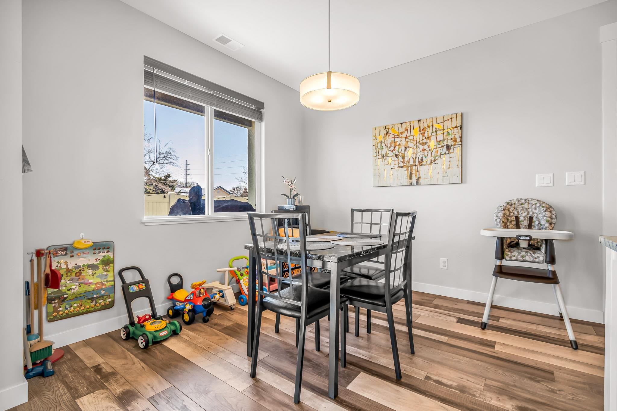506 Grama Court Grand Junction, CO 81504 - Photo 13 of 28 a view of a dining room with furniture