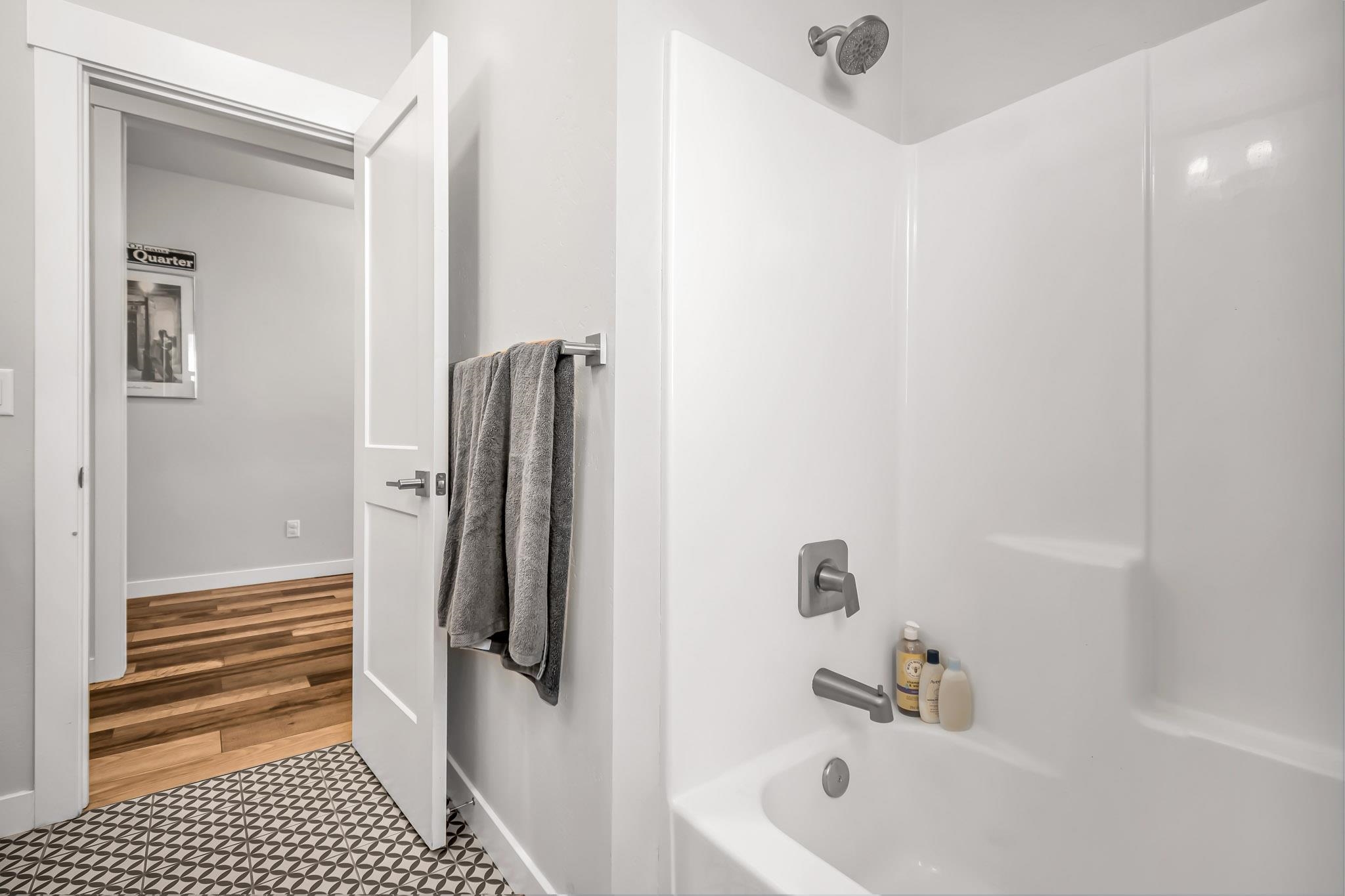 506 Grama Court Grand Junction, CO 81504 - Photo 21 of 28 a bathroom with a tub and a shower