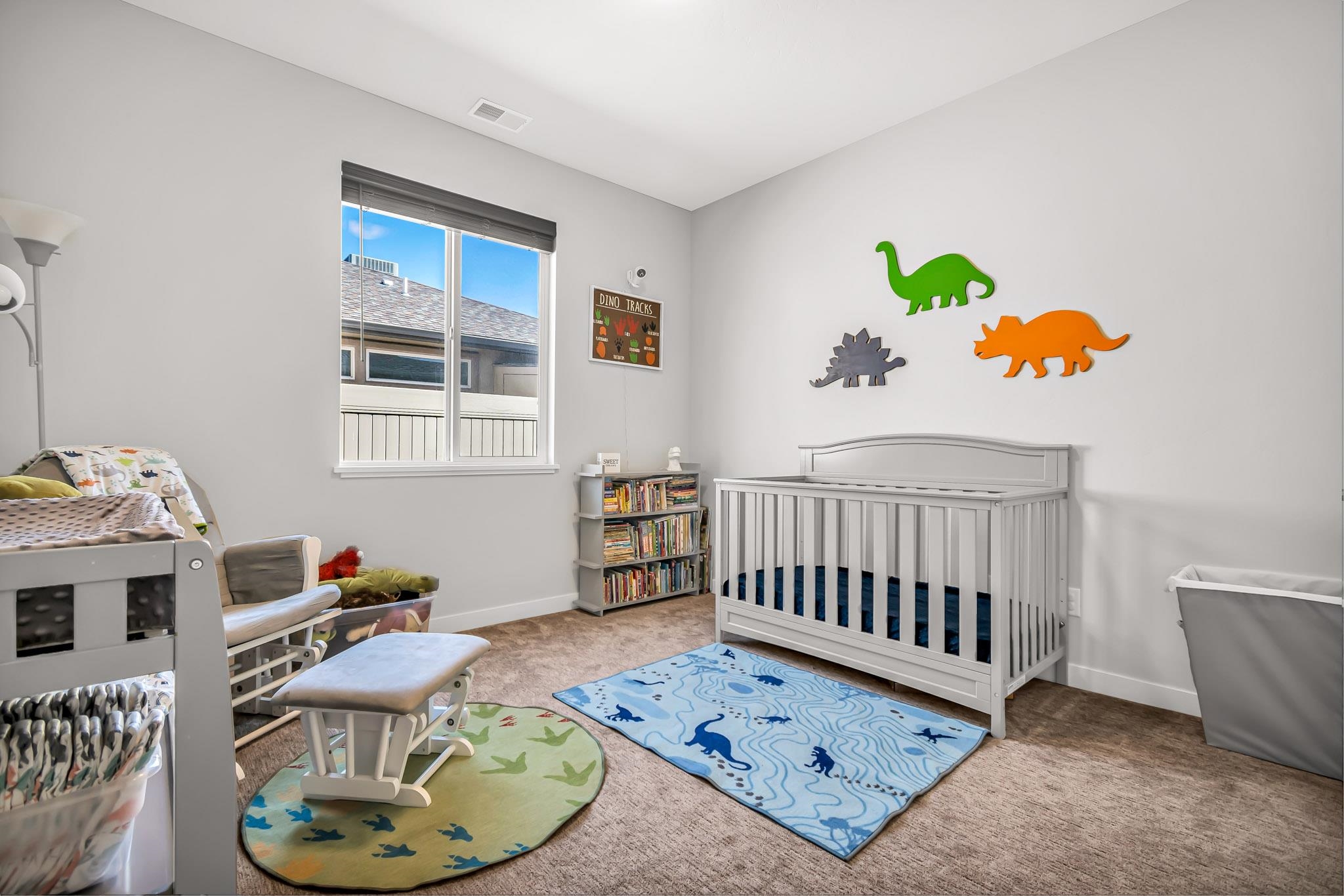 506 Grama Court Grand Junction, CO 81504 - Photo 23 of 28 a bedroom with furniture and a wooden floor