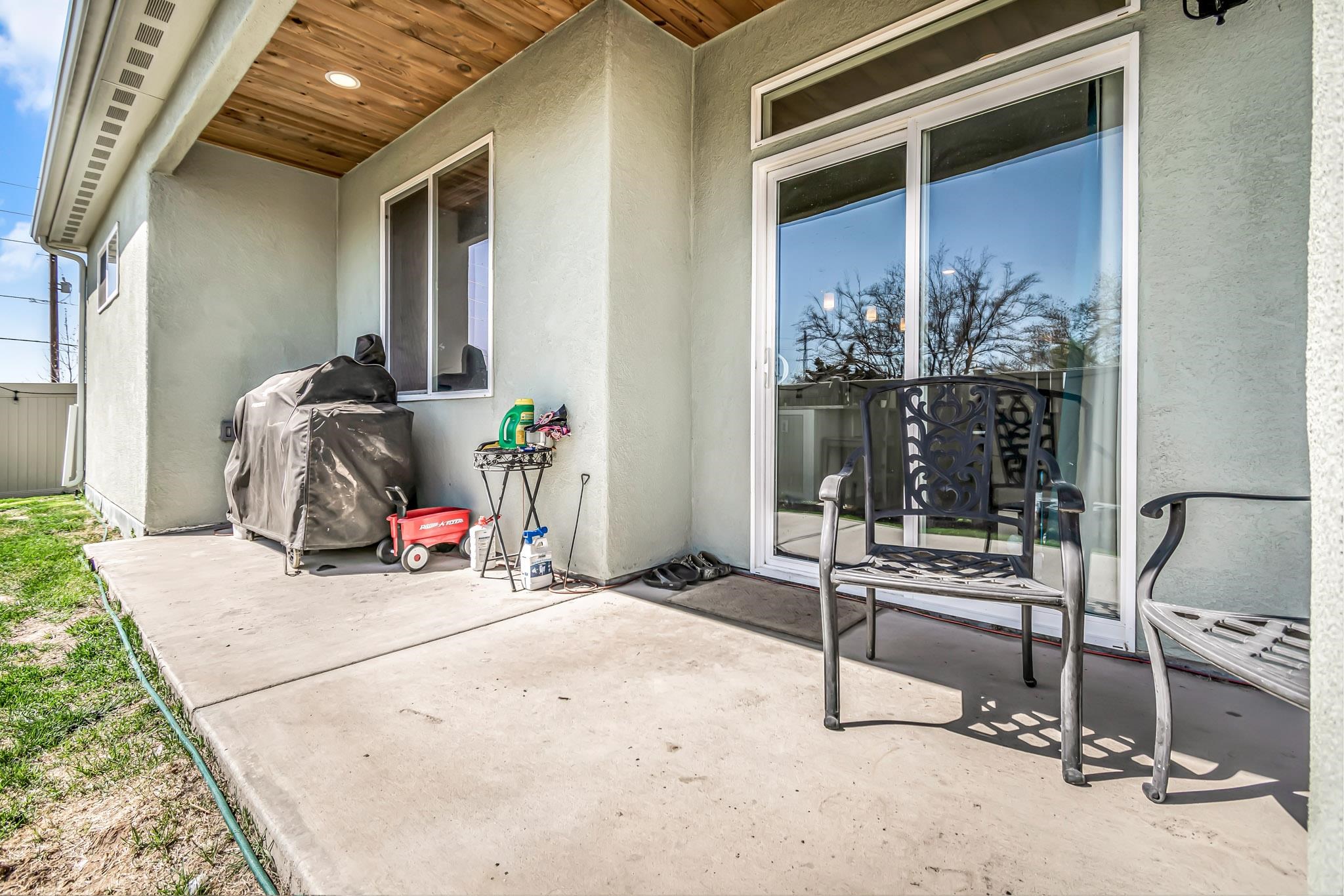 506 Grama Court Grand Junction, CO 81504 - Photo 26 of 28 a view of a hallway with a chair and table in the balcony